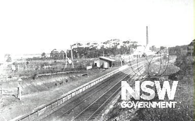Coniston Station, View to North, c1925. Coniston Railway Station looking south from the overhead bridge. The large chimney to the right of the station was part of the Coniston Brickworks which were later demolished