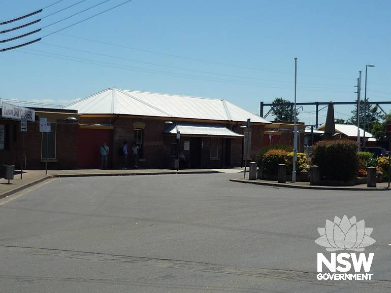 Riverstone Station viewed from Riverstone Parade with the war memorial at the foreground.