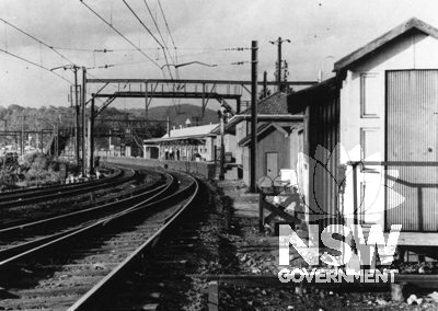 Hawkesbury River Station Group - Views of Hawkesbury River station from south looking north. Station footbridge at Newcastle end of platform. Causeway leading to Long Island tunnel in left distance.    c.1956