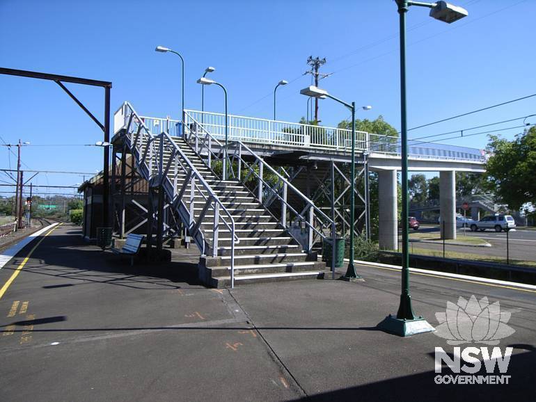 Steel beam footbridge on trestles provide access to the Great Western Highway side of the Valley Heights Station
