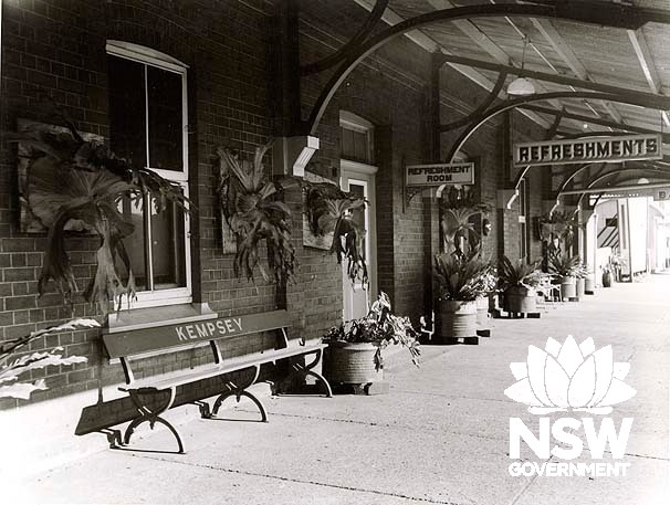 Kempsey Railway Station- showing Refreshments Room entrace, platform seating, and plantings.