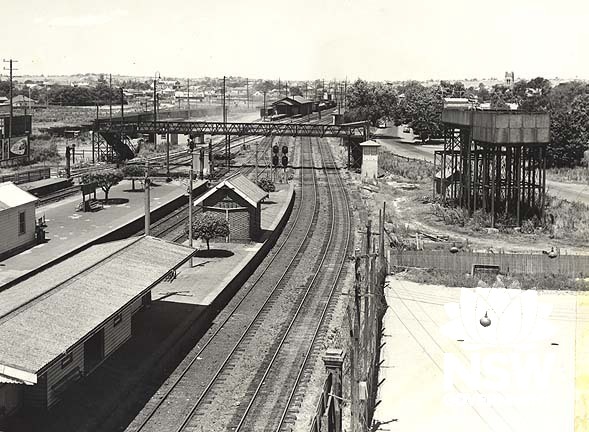 Maitland Railway Precinct- showing platforms, overhead water tank, and footbridge, 1956.