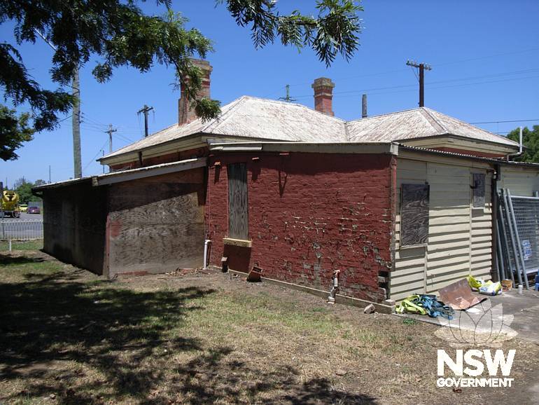 Weatherboard and brick lean-to additions to the Riverstone Station Master's residence.