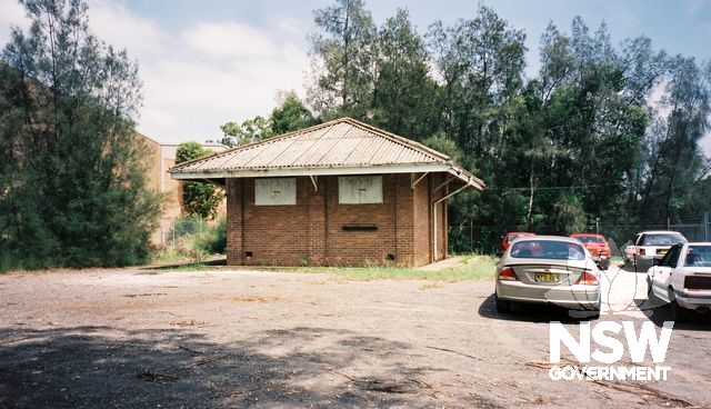 View of explosives storehouse from Dunheved Circuit showing the two shutter window openings and the large roof overhang.