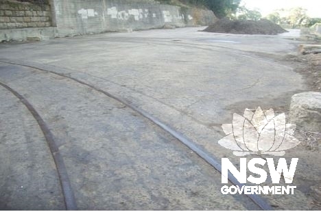 Rail tracks in floor slab in workshop portal entrance
