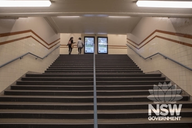 Milsons Point Railway Station - Stairs to the platforms. Note the maroon banding.