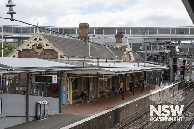 Liverpool Railway Station and Goods Shed - Platform building with modern footbridge in background.