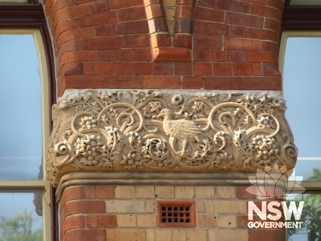 Building A: Carved sandstone pilaster capital with Australian flora & fauna