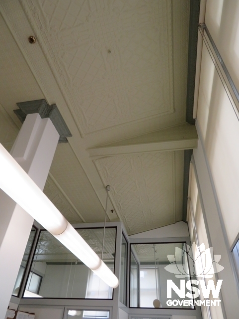 Blg B: Ground Floor office at north end with metal “fire resistant” ceiling under Turner Hall