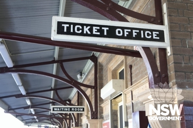 Bulli Railway Station Group - waiting room and ticket office signs on platform 1.