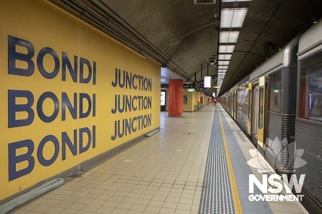 Bondi Junction Railway Station - Tri level signage on platform.