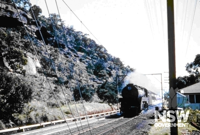 Loco 3808 hauling ‘Newcastle Express’, residence in right of picture