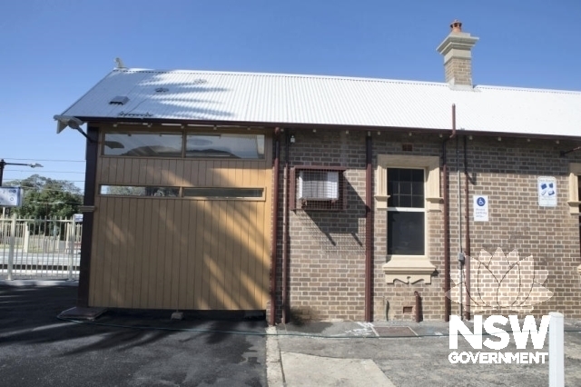 Bulli Railway Station Group - Platform 1 building with weatherboard enclosure at booking office.