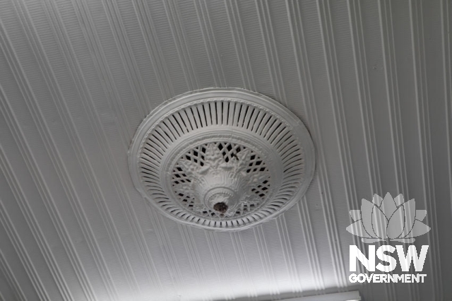Junee Railway Precinct - Decorative ceiling rose and ceiling.