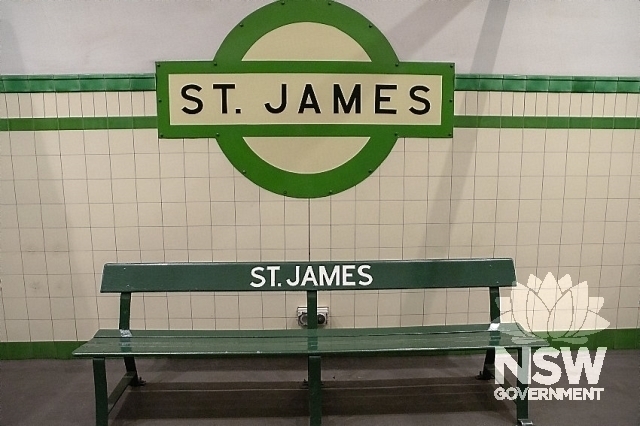 St James Railway Station -Bench seat and sign on the platform
