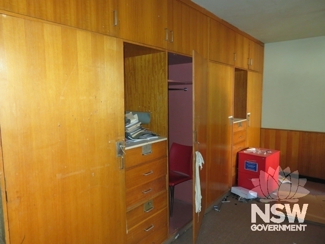 Block T2A: Original built-in wardrobe in bunk room