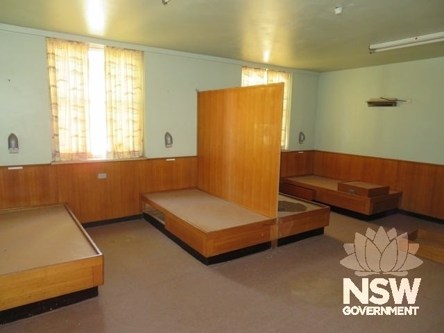 Block T2A: Original built-in beds with dividers in bunk room