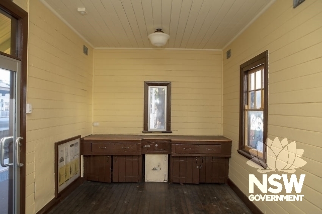 Marrickville Railway Station Group - Platform 2 building, showing ticket window, benches and safe.
