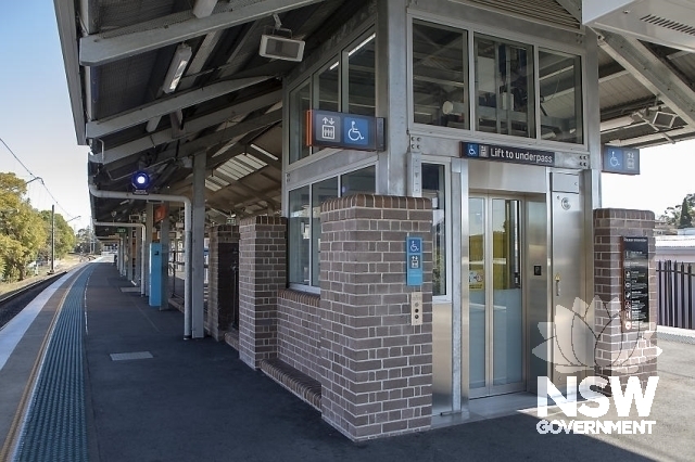 Berala Railway Station Group - Modern lifts under the awning on the platform.