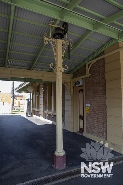 Junee Railway Precinct - Post with a bell between the platform buildings.