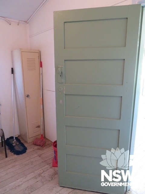 Block B: Original panel door to toilets on west verandah