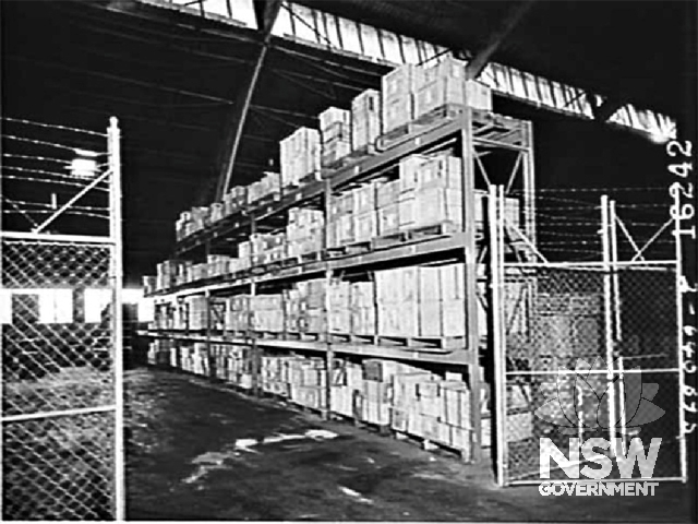 Brownbuilt shelving, Rudders (customs forwarding agents) bond free store, St. Peters, 1988.