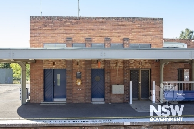 Dungog Railway Station - Dichromatic brickwork and fixed steel windows above awning