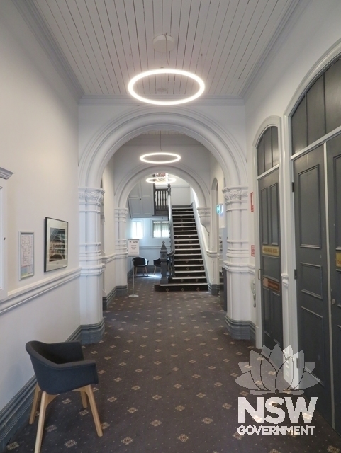 Building B: Entry hall looking north-east to the south staircase giving access to Turner Hall above