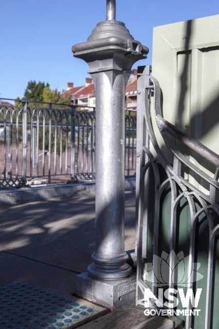 Petersham Railway Station Group - Decorative post on the footway at the top of the stairs.