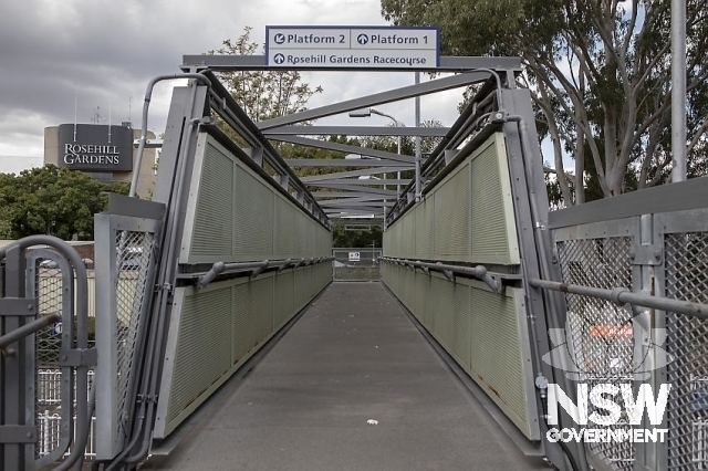 Rosehill Railway Station Footbridge - Trussed walkway with overhead supports.