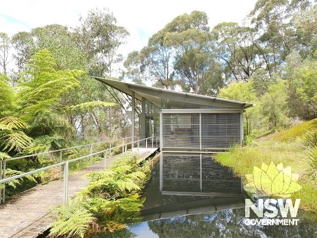 Northern elevation of main pavilion (house) and pond