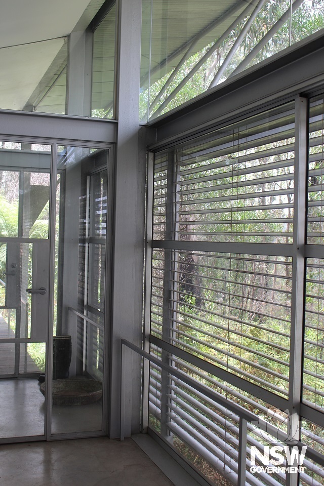 Airlock and layered rectractable wall