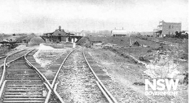The Bankstown Railway Station under construction. The Accommodation House constructed at the behest of Arthur Rickard can be seen to the far right (Reproduced in Sydney’s New Residential Suburb: Greenacre Park, Bankstown, p.12)