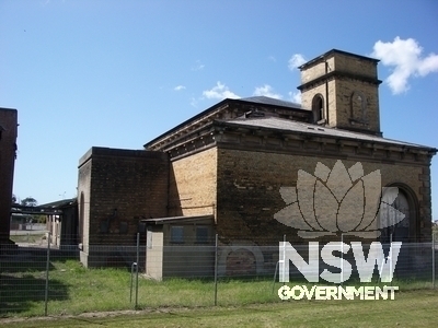 Rear view of the main power house building with lean-to additions, showing boiler room 1 in the foreground