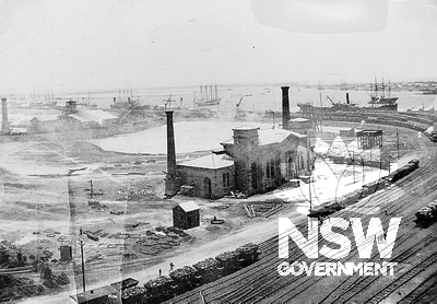 Panorama taken late 1908 from the top of the Clyde Hotel, corner Cowper & Lott Steets, Carrington. The power house is in operation, coal wagons rest along the tracks in front, and ships wait at The Dyke's cranes behind. (Hunter Photobank, 168 000008)