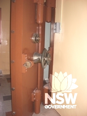 Close view of vault door, basement pay room.