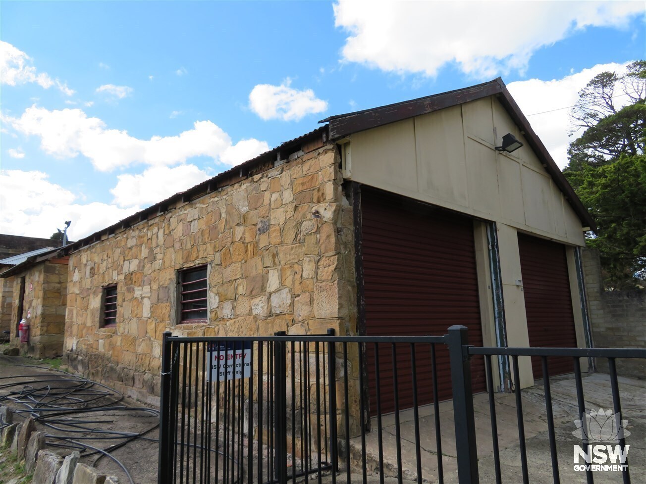 Southern façade of the farm buildings showing later garage addition, Berrima Correctional Centre, 2017