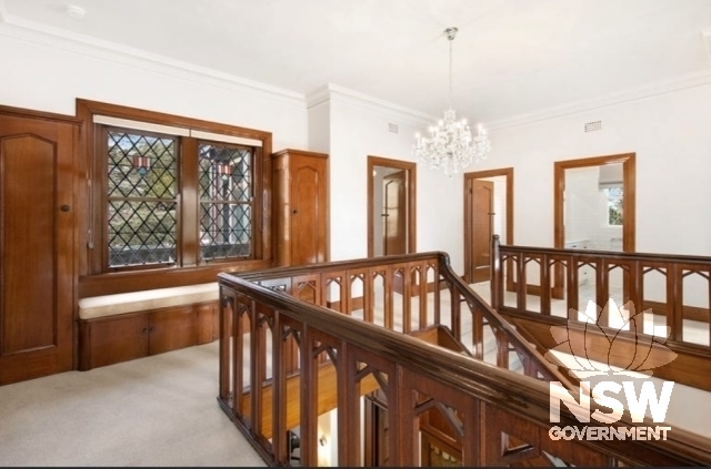 First floor hall, joinery and stained glass windows