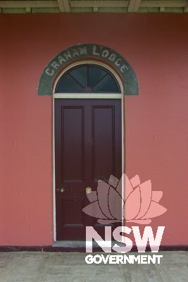 Graham Lodge front door on east façade with original lettering restored, 2003