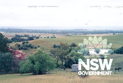 View from northern ridge looking south west to Homestead Precinct and dam.