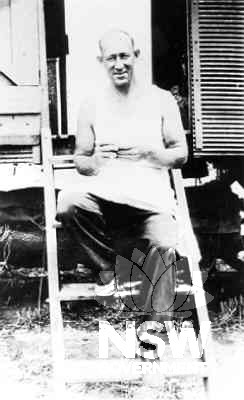 The Cook outside his galley.