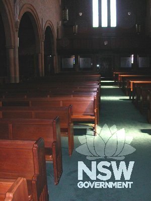 Nave detail with pews.