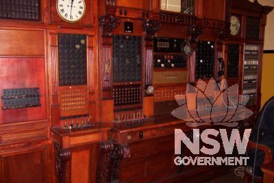Edward Smith Headquarters Switchboard showing woodcarving, alarm indicator panels, telephone switches and clocks