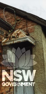 Fauna commemorating Federation, c.1995, decorative door glazing is concealed.