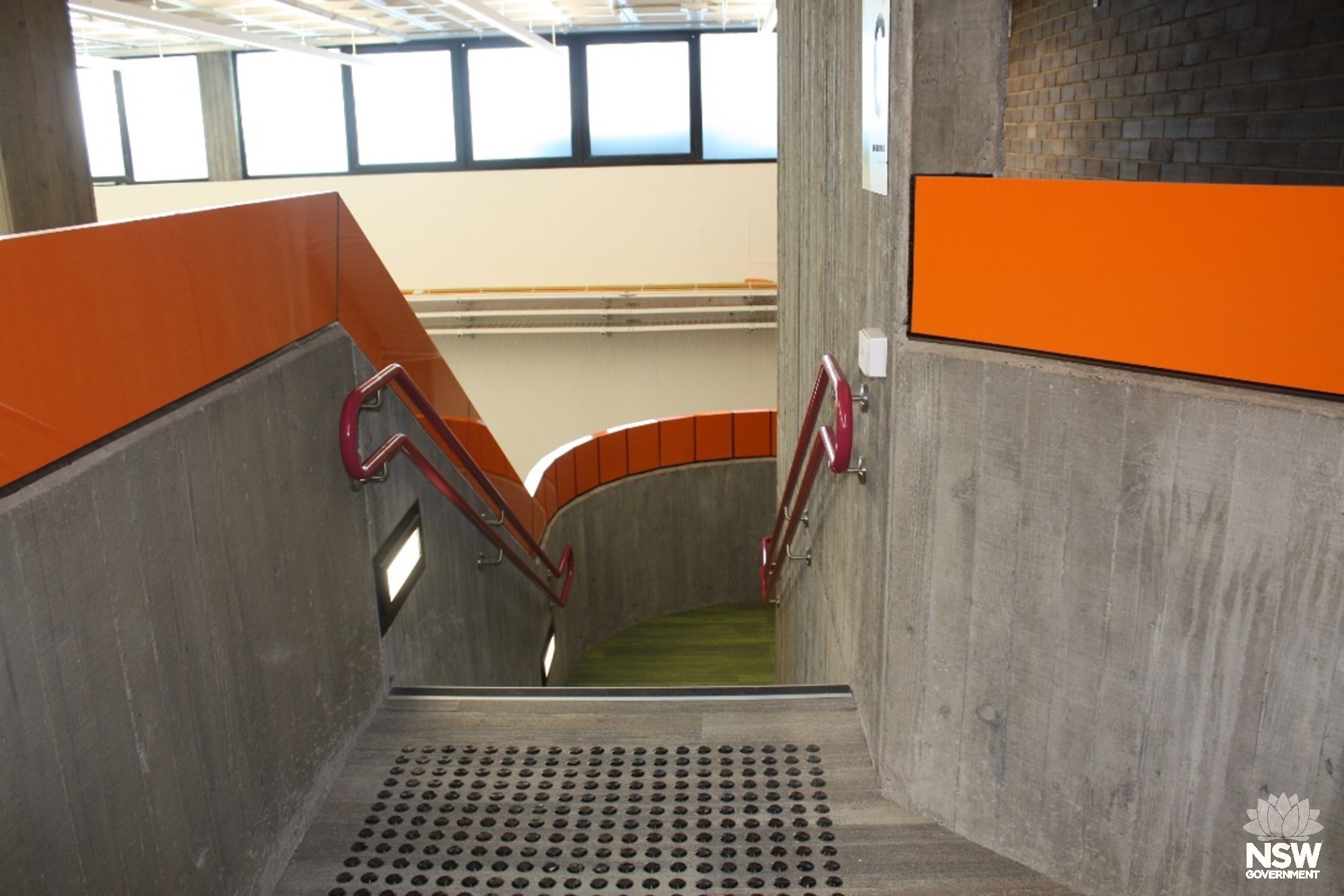 Interior staircase with added height to balustrade and extended handrail for BCA compliance  Stage 2 building