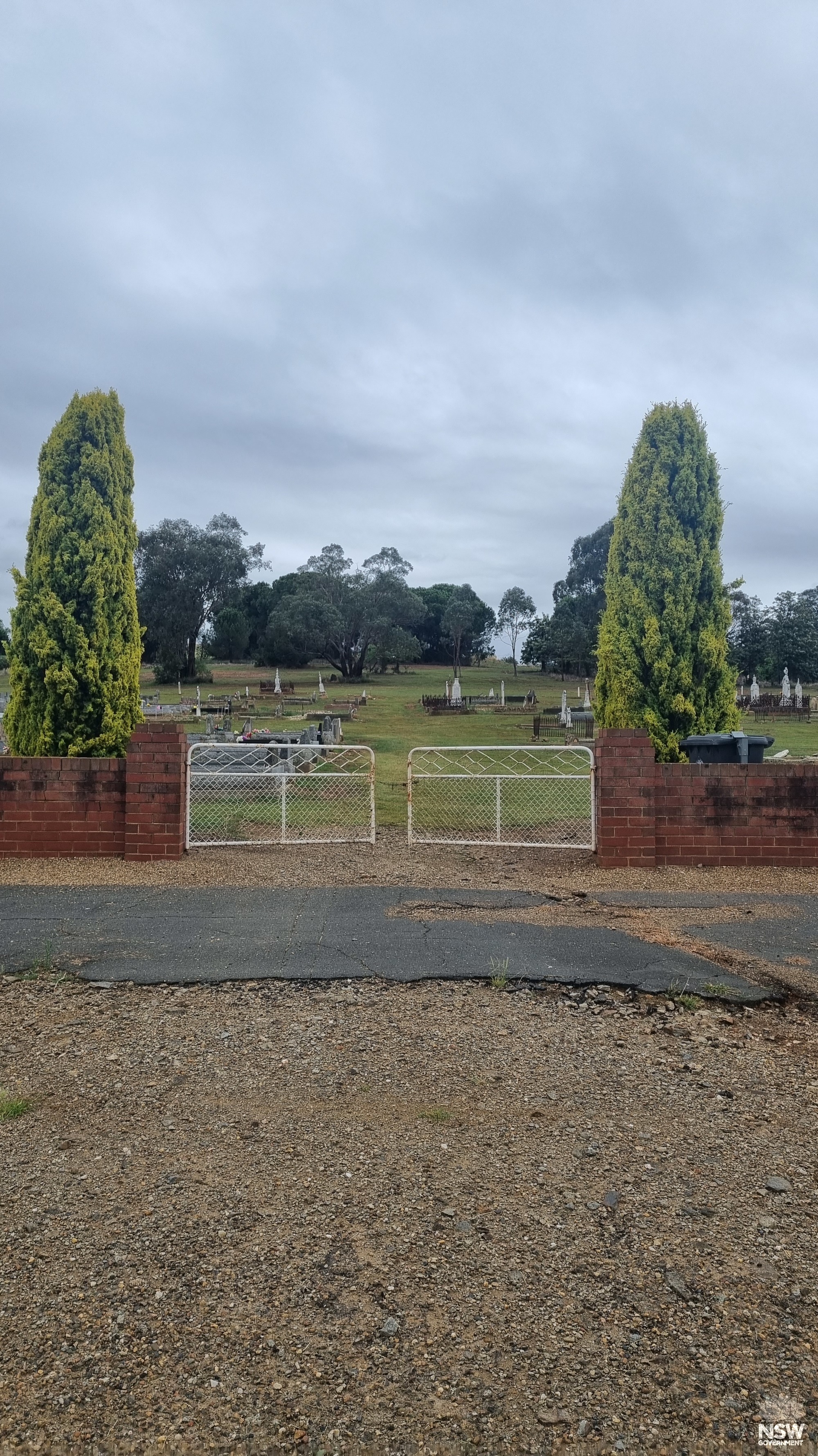 View through gate of North Gundagai Cemetery towards Captain Moonlite's Grave