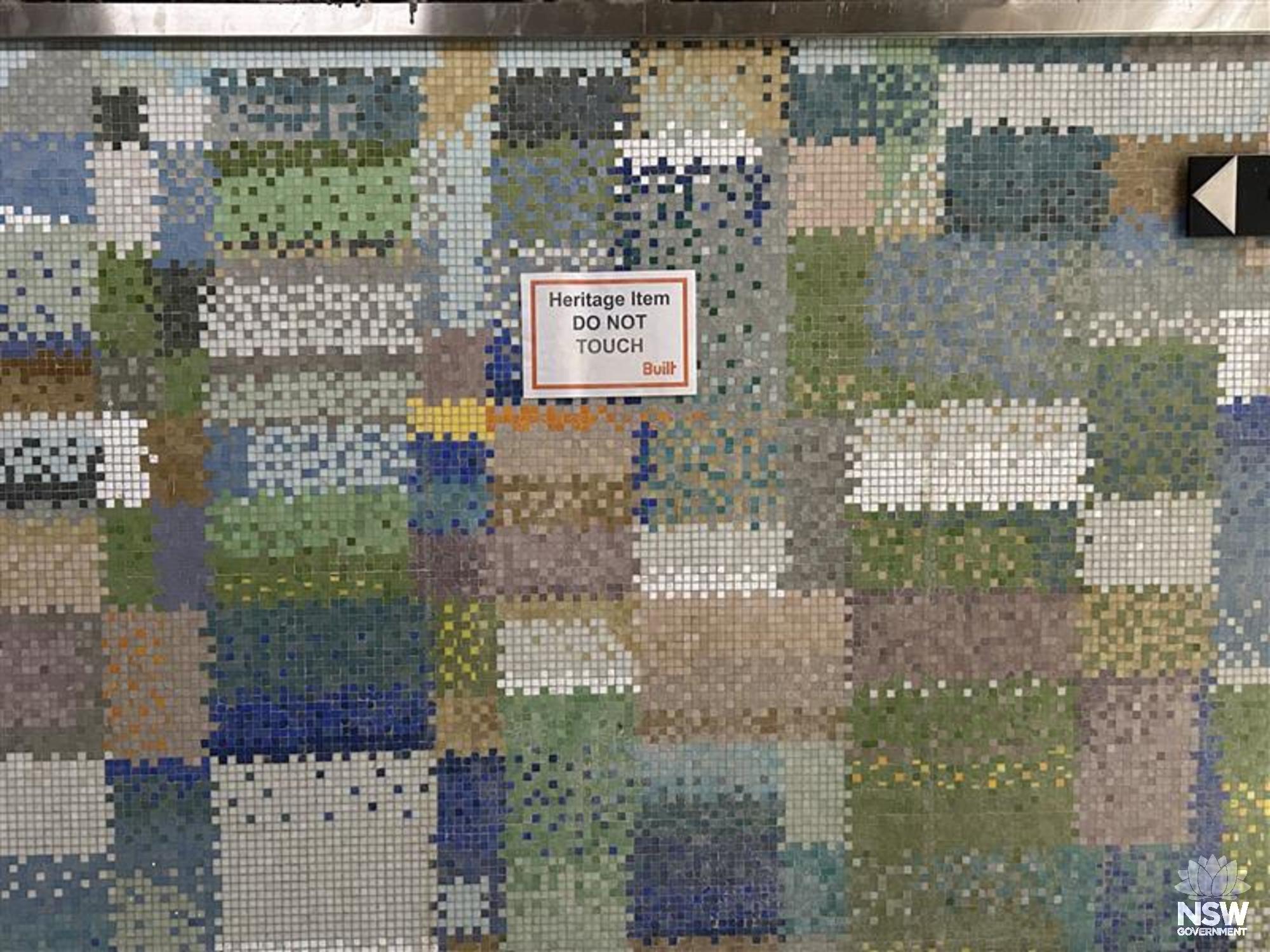 Abstract mosaic wall tiling in lift lobby by Michael Santry